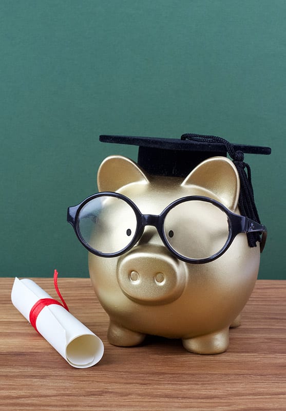 Piggy bank with diploma